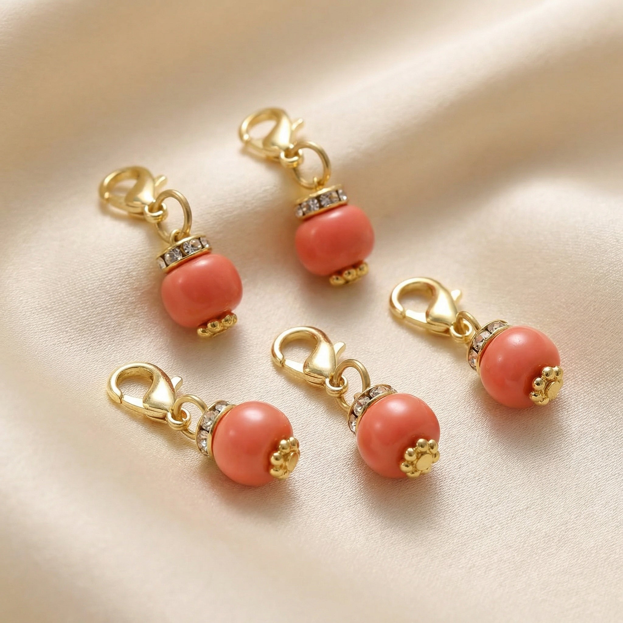 Håndlagde maskemarkører – Korall - Strikkeredet Design - Annet strikketilbehør