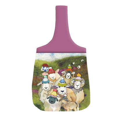 Liten håndleddsveske – Happy Sheep – Emma Ball - Strikkeredet Design -